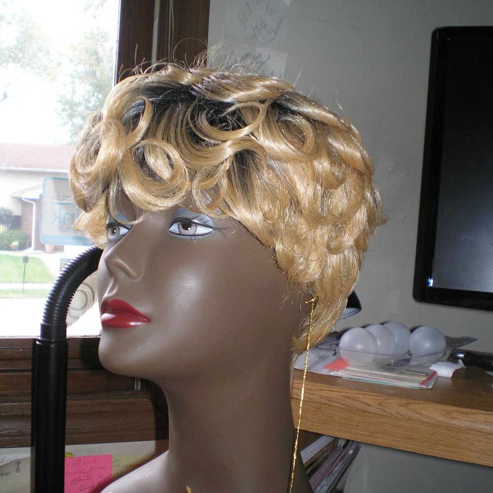 It's a wig - Pin Curl color TT1B Butter Cream